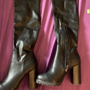 Never worn Buffalo thigh high boots